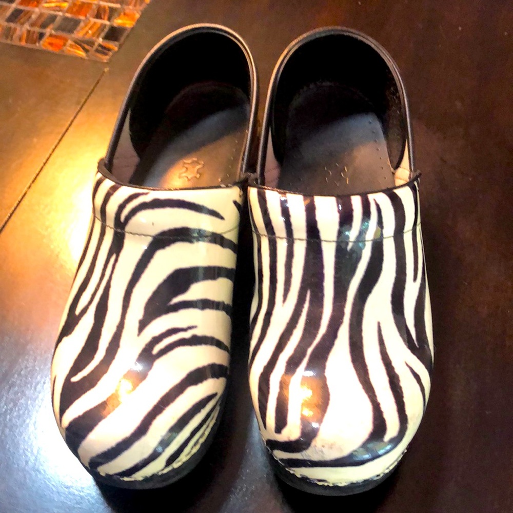 Size 38. Zebra Dansko clogs.